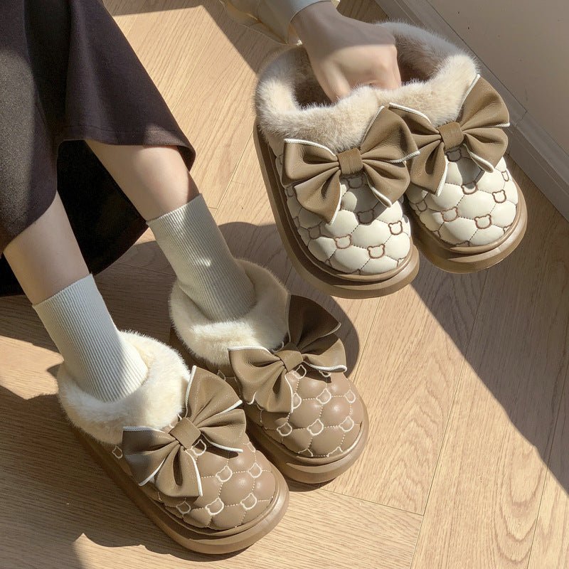 Women's waterproof cotton bootie shoes featuring a butterfly knot design.