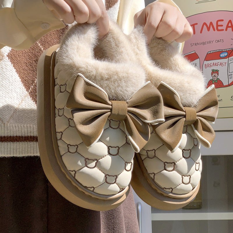 Women's waterproof cotton bootie shoes featuring a butterfly knot design.
