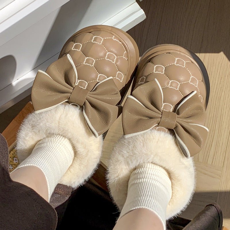 Women's waterproof cotton bootie shoes featuring a butterfly knot design.