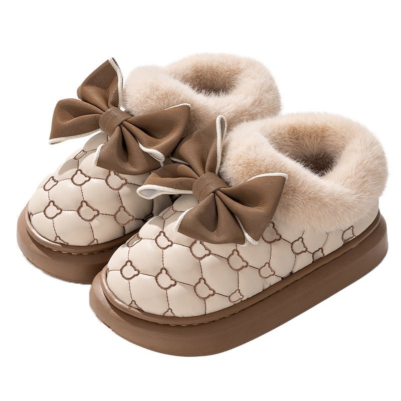 Women's waterproof cotton bootie shoes featuring a butterfly knot design.