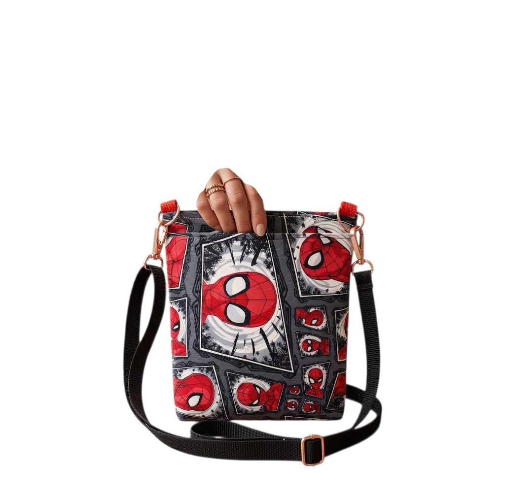 JUST-JEN BOUTIQUE Spider-Man comic print crossbody bag with black adjustable strap and rose gold hardware