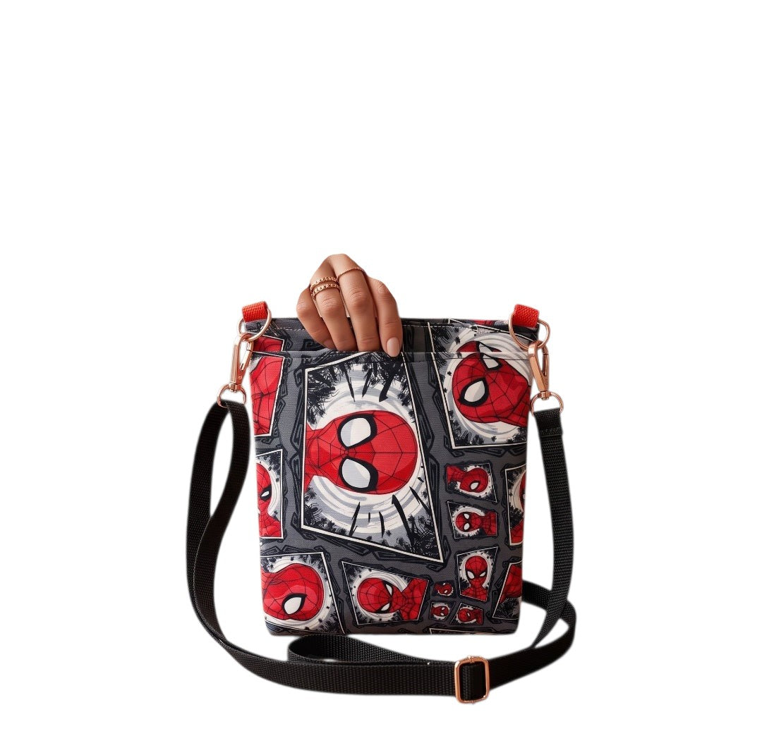 JUST-JEN BOUTIQUE Spider-Man comic print crossbody bag with black adjustable strap and rose gold hardware