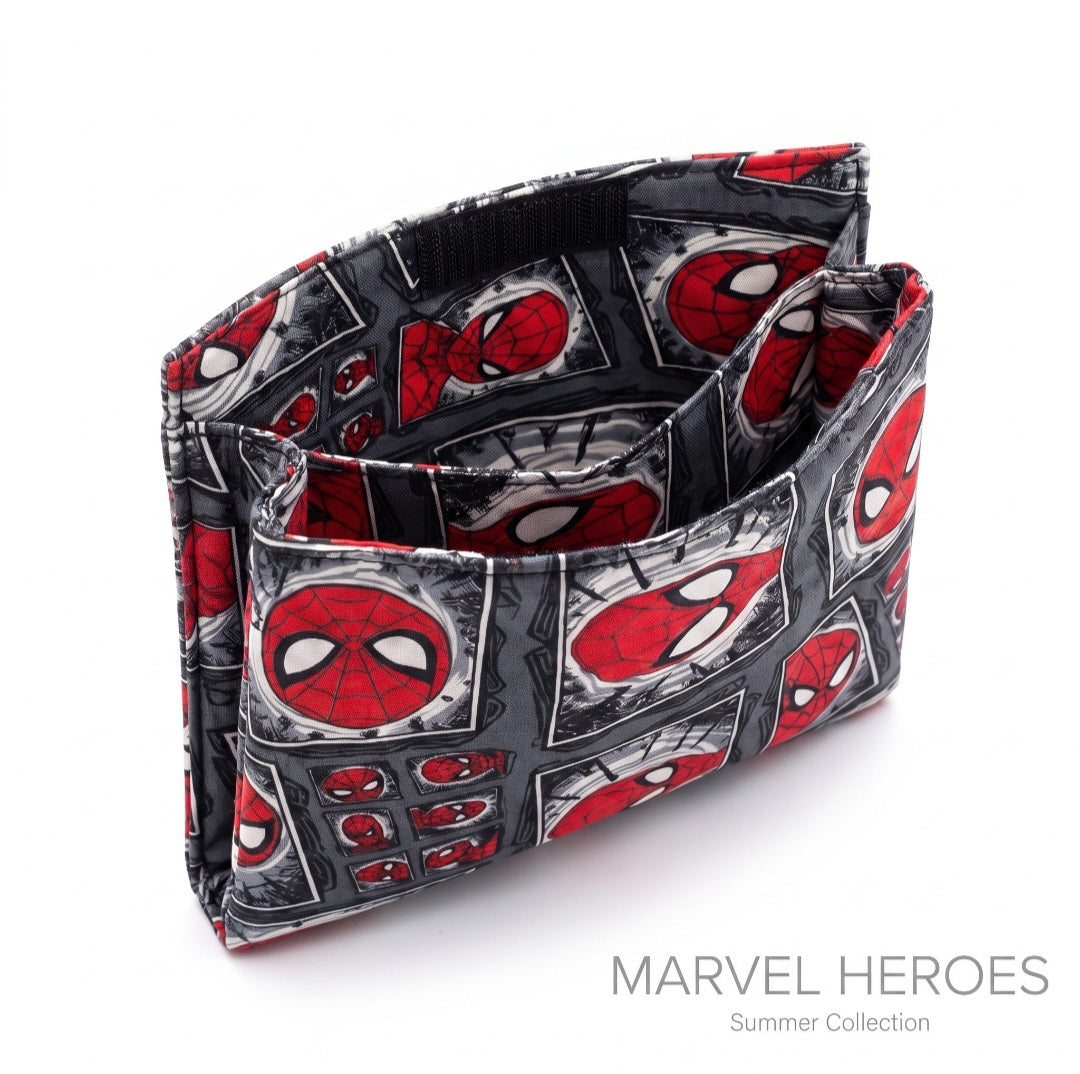 JUST-JEN BOUTIQUE Spider-Man comic print fabric crossbody bag with open interior compartments on white background
