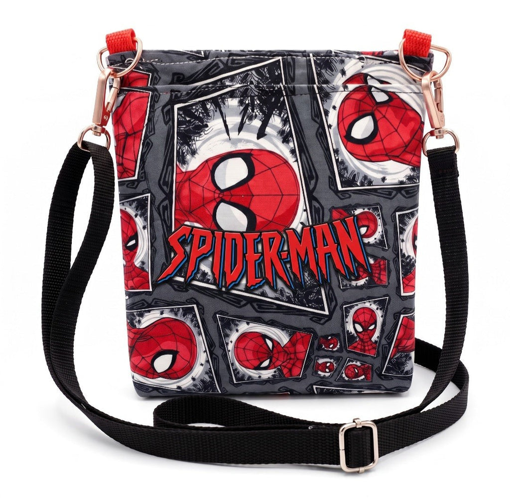 JUST-JEN BOUTIQUE Spider-Man crossbody bag with a comic book print, adjustable black strap, and red accents.